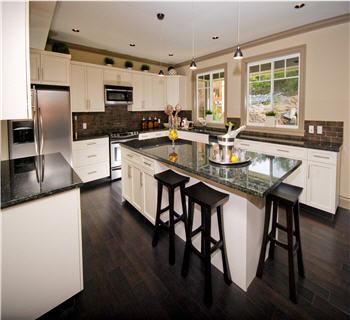 Kitchen with granite countertops and hardwood floor